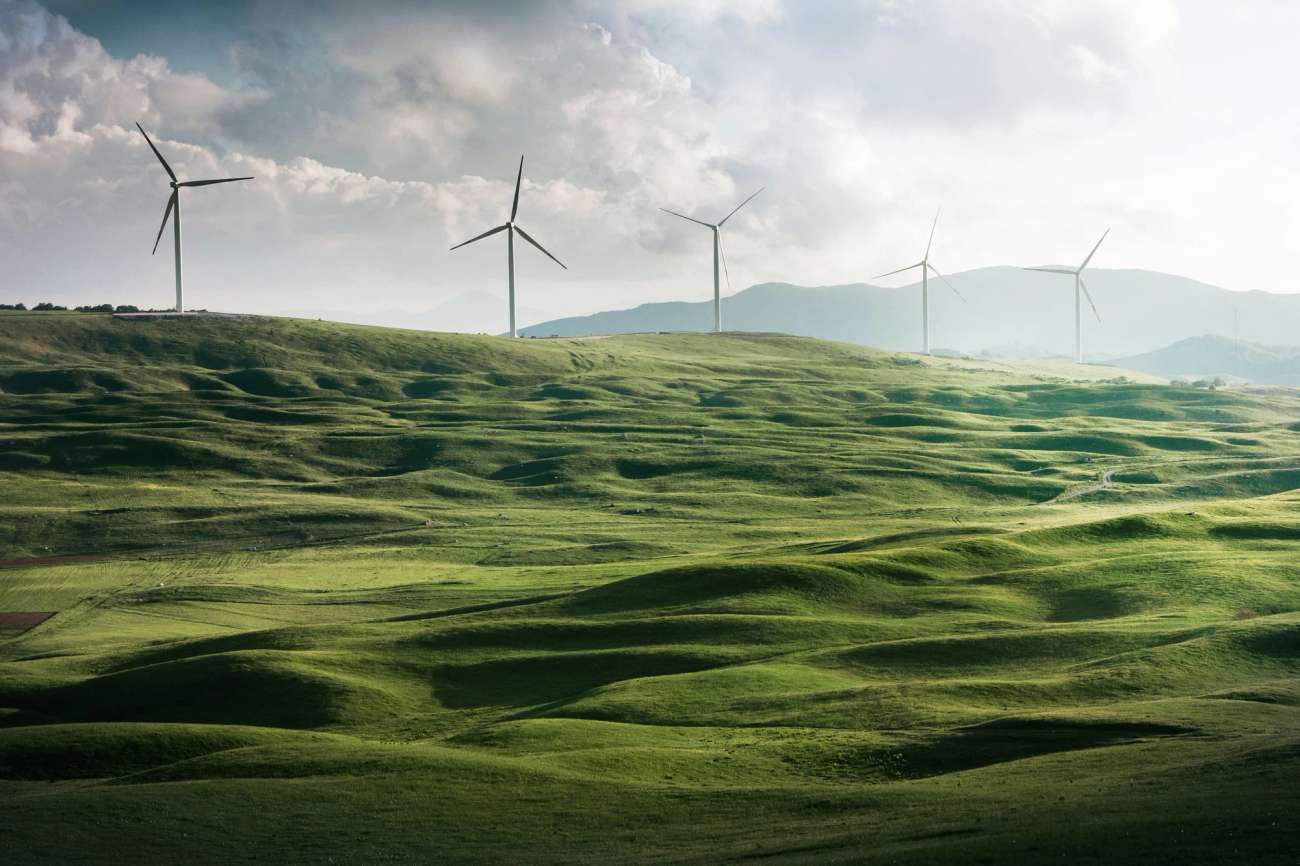 Wind turbines in a green field