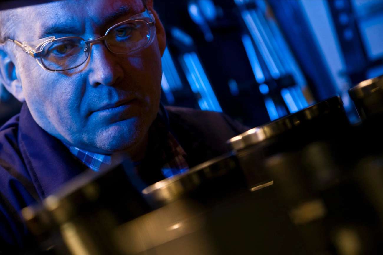 Person looking at machined metal tools