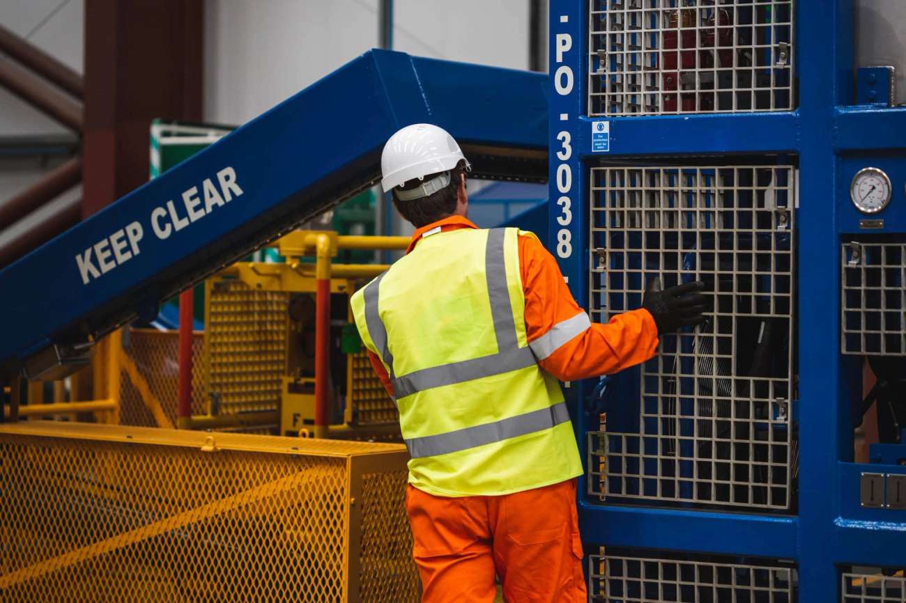 Person from behind in PPE