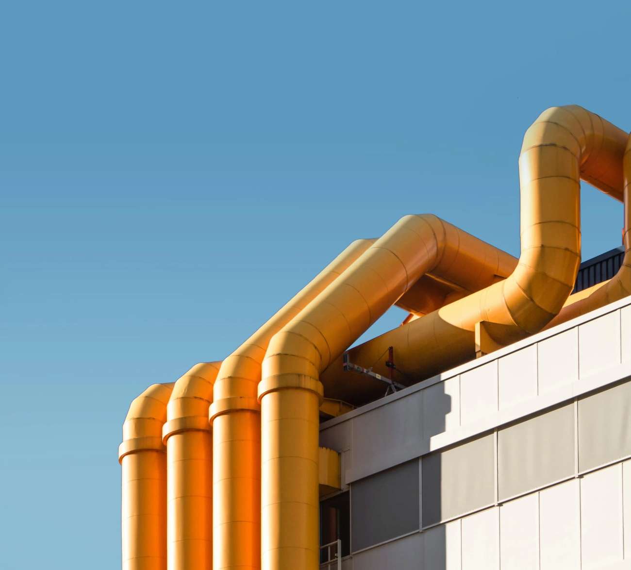 Yellow tubes on a building