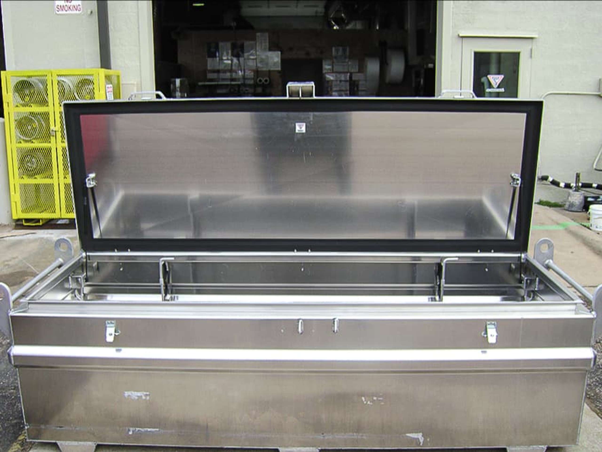 Large metal box with open lid